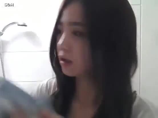 Young Korean girl in the bathroom